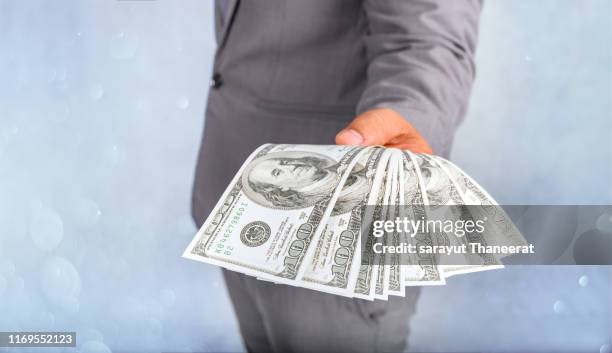 businessmen hand to send money, bank notes, catch money, payment concepts - money borrow stockfoto's en -beelden