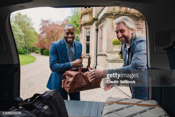 let's get checked in! - entry car imagens e fotografias de stock