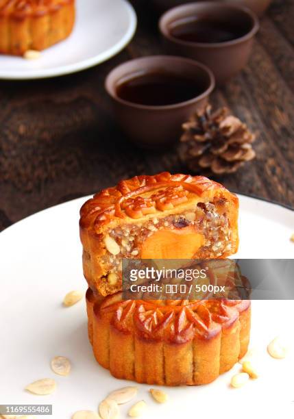 chinese mid-autumn festival food, mooncakes and tea - mooncake stock pictures, royalty-free photos & images