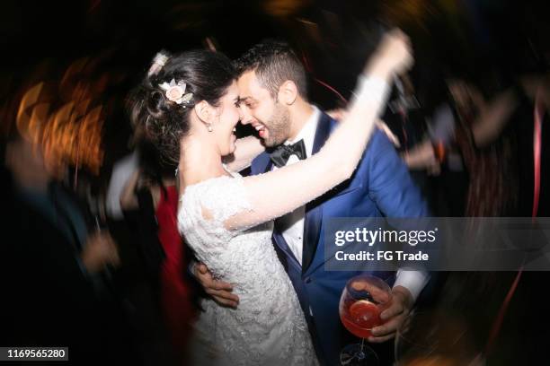 bride and groom dancing during their wedding party - drunk husband stock pictures, royalty-free photos & images