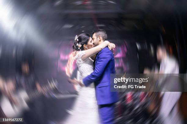 bride and groom kissing in the dance floog - drunk husband stock pictures, royalty-free photos & images