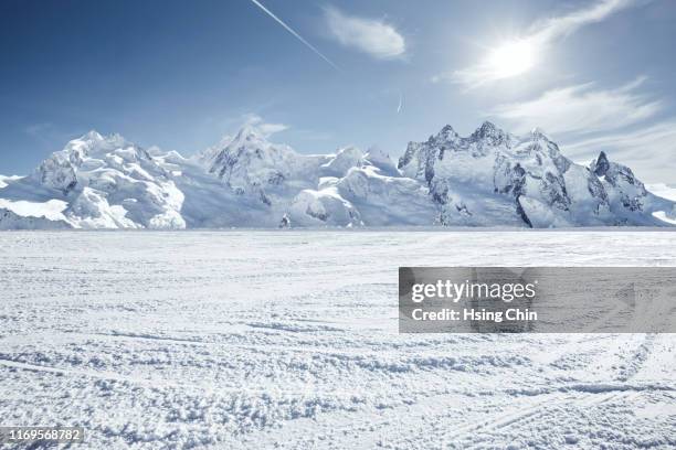 snow mountain in switzerland - icy roads stockfoto's en -beelden