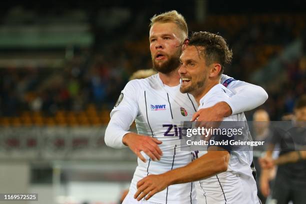 James Holland of Lask celebrates with his teammate Klauss of Lask after scoring the opening goal during the UEFA Europa League match between LASK and...