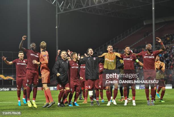 Players of CFR Cluj 1907 celebrates after winning the UEFA Europa League Group E football match CFR Cluj v Lazio in Cluj, northern Romania, on...
