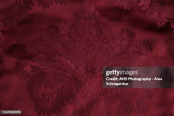 red velvet texture with print - velvet photos et images de collection