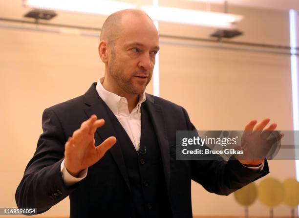 Derren Brown performs at the media day and photo call for the new broadway show "Derren Brown: Secret" at The New 42nd Street Studios on August 22,...