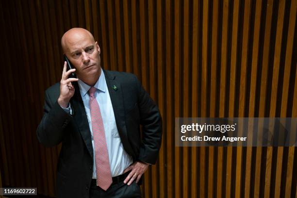 Marc Short, Chief of Staff to Vice President Mike Pence, takes a phone call as U.S. Vice President Mike Pence speaks a meet and greet with NYPD...