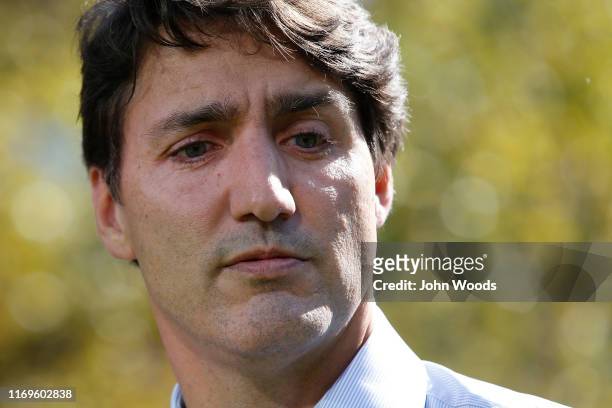 Canadian Prime Minister Justin Trudeau addresses the media regarding photos and video that have surfaced in which he is wearing dark makeup on...