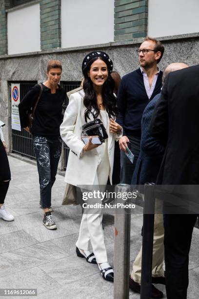 Guest outside Armani at Milan Fashion Week, Milano, Italy, on September 19 2019, Italy