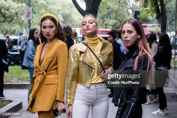 Guest outside Armani at Milan Fashion Week, Milano, Italy, on September 19 2019, Italy