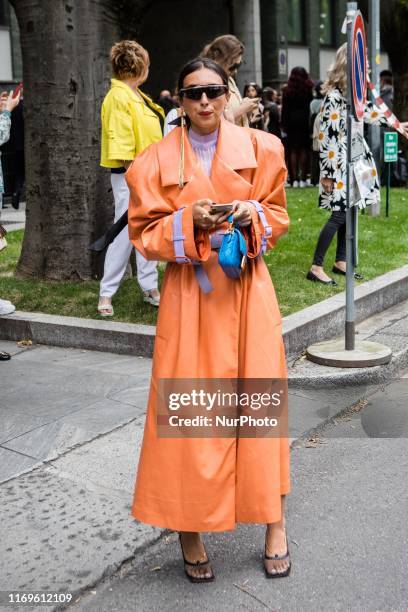 Guest outside Armani at Milan Fashion Week, Milano, Italy, on September 19 2019, Italy