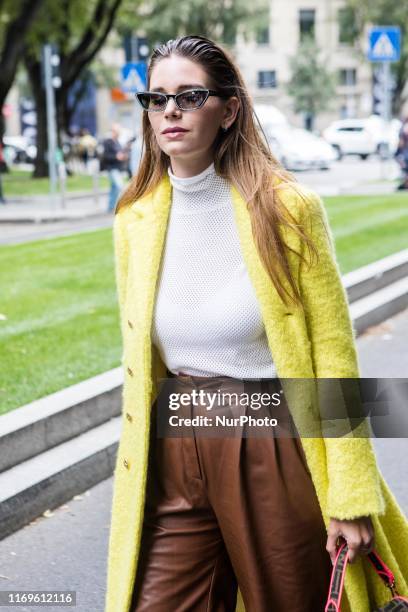 Guest outside Armani at Milan Fashion Week, Milano, Italy, on September 19 2019, Italy