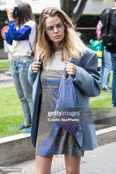 Guest outside Armani at Milan Fashion Week, Milano, Italy, on September 19 2019, Italy