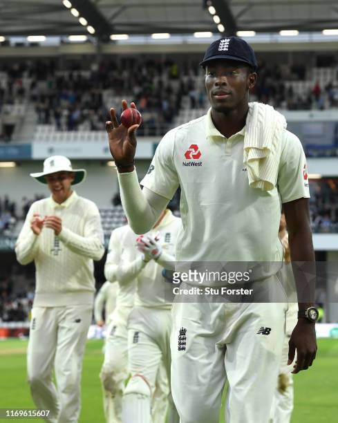 England bowler Jofra Archer leaves the field holding the ball after claiming 6 wickets during day one of the 3rd Ashes Test match between England and...