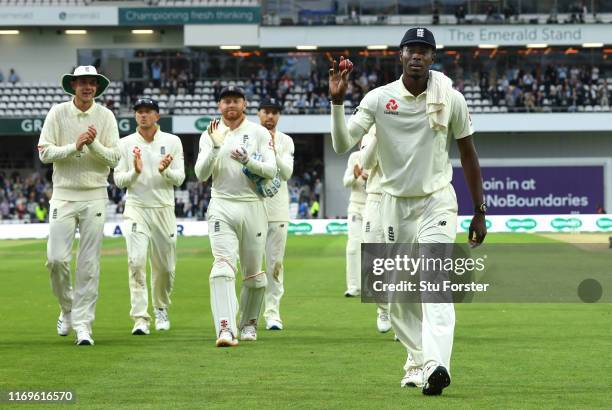 England bowler Jofra Archer leaves the field holding the ball after claiming 6 wickets during day one of the 3rd Ashes Test match between England and...