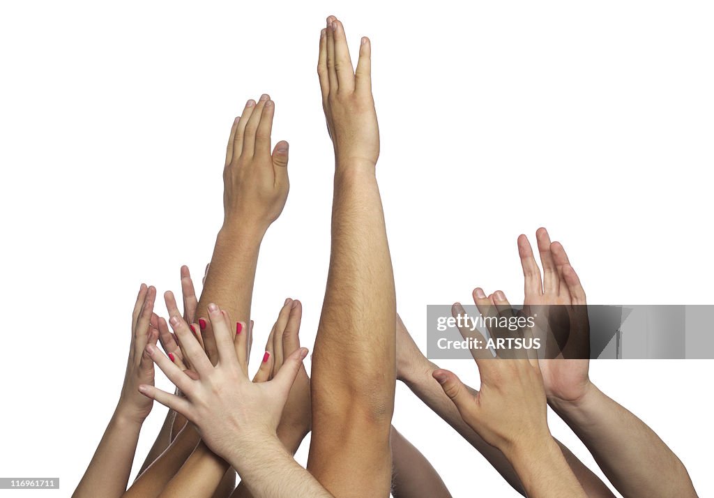 Multiple Hand Reaching Several Human Hands Reaching Up Over A White Background High-Res Stock ...