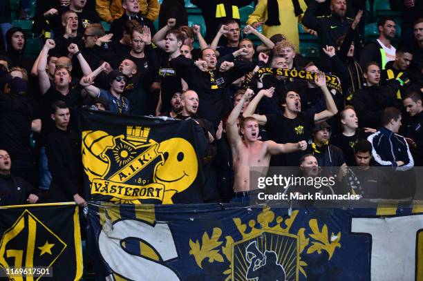 Fans support their team during the UEFA Europa League Play Off First Leg match between Celtic and AIK at Celtic Park on August 22, 2019 in Glasgow,...