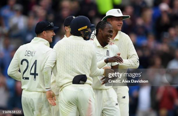 Jofra Archer celebrates the wicket of Matthew Wade of Australia with his teammates during Day One of the 3rd Specsavers Ashes Test match between...