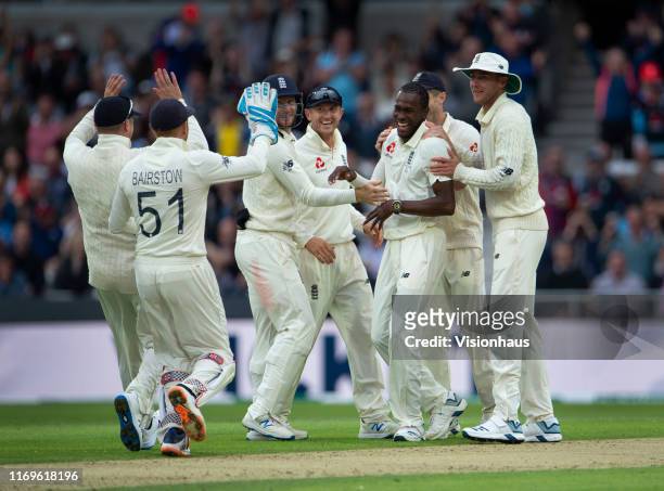 Jofra Archer of England is congratulated by team mates after dismissing Matthew Wade of Australia during day one of the 3rd Ashes Test match between...
