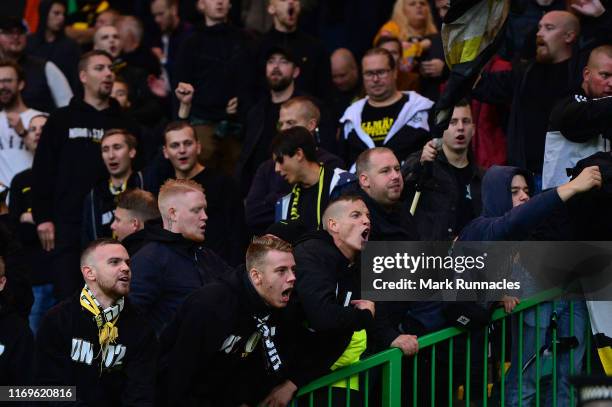 Fans support their team during the UEFA Europa League Play Off First Leg match between Celtic and AIK at Celtic Park on August 22, 2019 in Glasgow,...