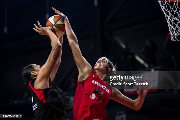 Elena Delle Donne of the Washington Mystics blocks a shot against Liz Cambage of the Las Vegas Aces during the first half of Game Two of the 2019...