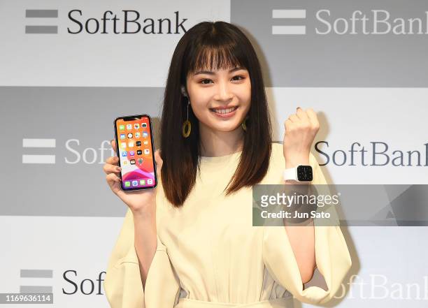 Actress Suzu Hirose attends the launch ceremony for iPhone 11/iPhone 11 Pro at Softbank Ginza store on September 20, 2019 in Tokyo, Japan.