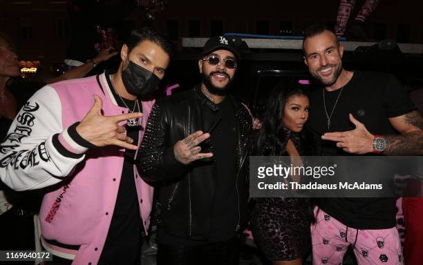 Alec Monopoly, guest Lil' Kim, and Philipp Plein attend the Philipp Plein After Party during Milan Fashion Week Spring/Summer 2020 on September 19,...