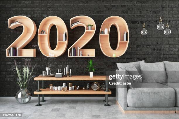 2020 boekenplank met gezellig interieur - new year 2020 stockfoto's en -beelden