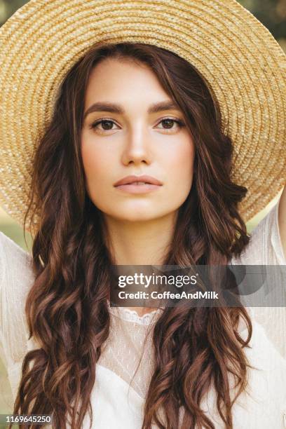 happy girl walking through the summer park - women beauty in nature beauty stock pictures, royalty-free photos & images