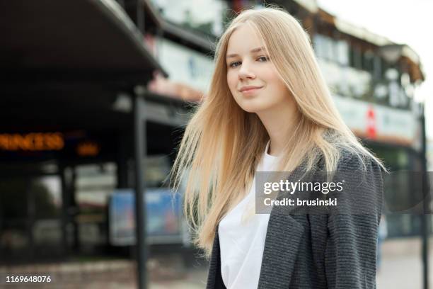 close-up outdoor portrait of a 13 year old blonde teenage girl - year long stock pictures, royalty-free photos & images