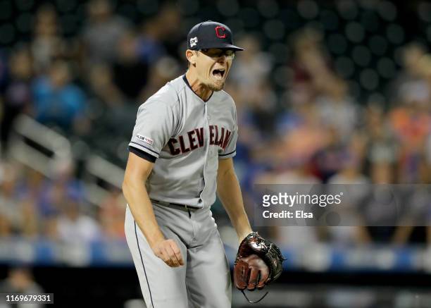 Tyler Clippard of the Cleveland Indians reacts after a throwing error on a hit by Todd Frazier of the New York Mets in the seventh inning at Citi...