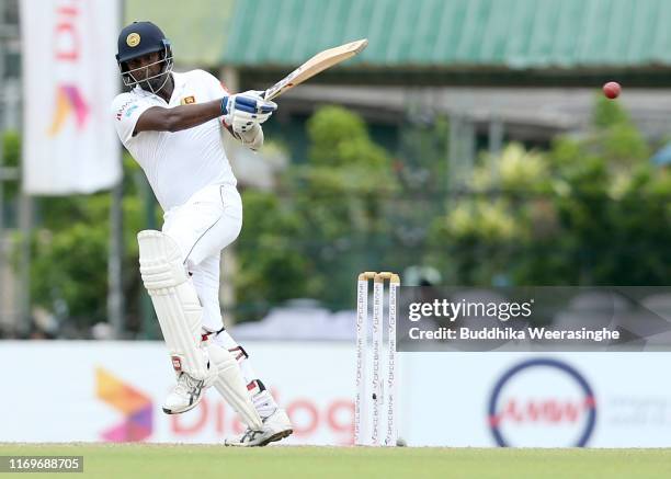 Angelo Mathews of Sri Lanka hits out during the day two of the Second Test match between Sri Lanka and New Zealand at Paikiasothy Saravanamuttu...