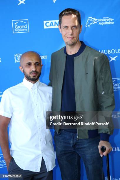 Directors Mehdi Idir and Grand Corps Malade aka Fabien Marsaud attend the Photocall of the movie "La Vie Scolaire" during the 12th Angouleme...