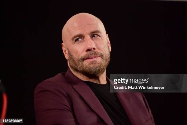 John Travolta speaks onstage during the premiere of Quiver Distribution's "The Fanatic" on August 22, 2019 in Hollywood, California.