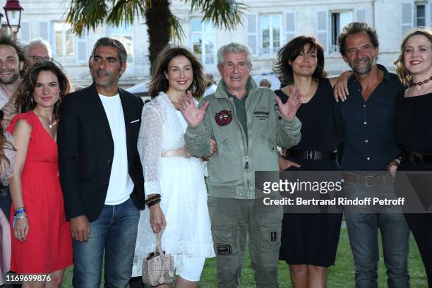 Claire Morin, Ary Abittan, Elsa Zylbertstein, Director Claude Lelouch, Marianne Denicourt, Stephane de Groodt and Agnes Soral attend the Photocall of...