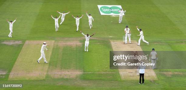 Jofra Archer of England celebrates dismissing Pat Cummins of Australia during day one of the 3rd Specsavers Ashes Test match between England and...