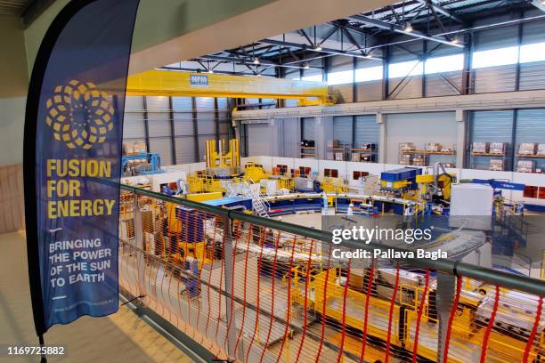 Workers make the Super Conducting magnets at an ITER facility which is part of a mega construction effort taking place in Southern France where...