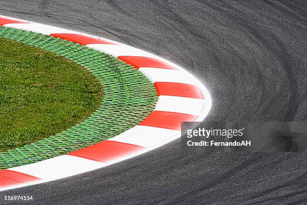 corner on a race track - circuit stock pictures, royalty-free photos & images