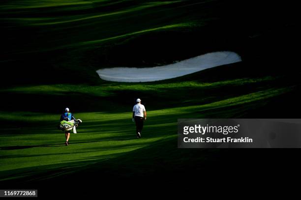 Thomas Bjorn of Denmark walks down the 17th fairway during Day Two of the Scandinavian Invitation at The Hills and Sports Club on August 23, 2019 in...