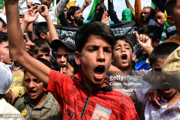 Kashmiri kids shout pro-freedom slogans during protests after friday prayers in Srinagar, Indian Adminstered Kashmir on 20 September 2019....