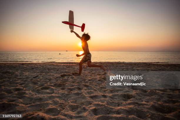 i would fly so high - beach sunrise stock pictures, royalty-free photos & images