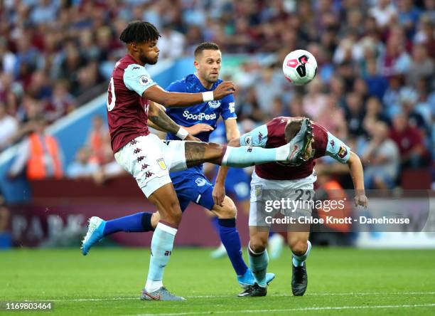 Tyrone Mings and Bjorn Engels of Aston Villa collide during the Premier League match between Aston Villa and Everton FC at Villa Park on August 23,...