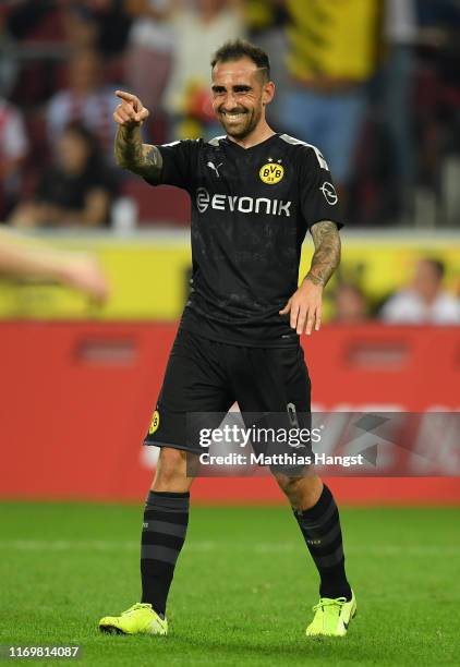 Paco Alcacer of Borussia Dortmund celebrates scoring his side's third goal during the Bundesliga match between 1. FC Koeln and Borussia Dortmund at...