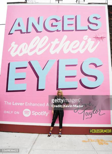 Taylor Swift poses with Spotify Mural on Album Release Day at Kent Avenue and South 1st Street, Williamsburg, on August 23, 2019 in Brooklyn, New...