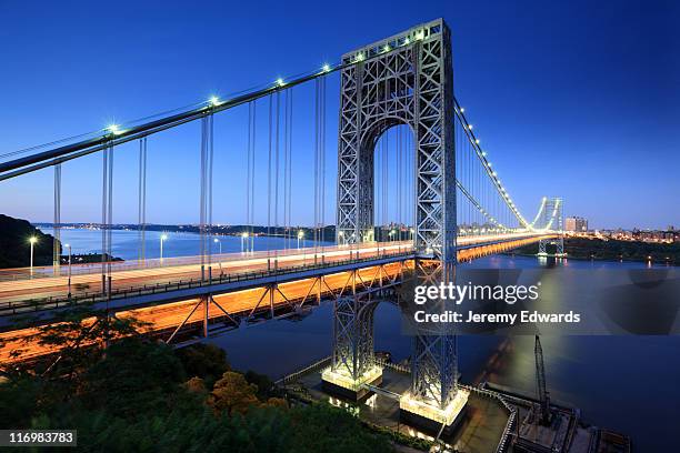 long exposure shot of a bridge during sunset - george washington bridge stock pictures, royalty-free photos & images
