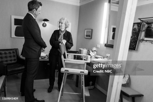 Episode 886 -- Pictured: Host Seth Meyers talks with author Margaret Atwood backstage on September 19, 2019 --