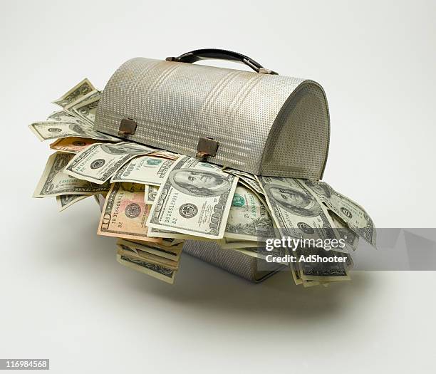 lunch bucket - overflowing money stock pictures, royalty-free photos & images