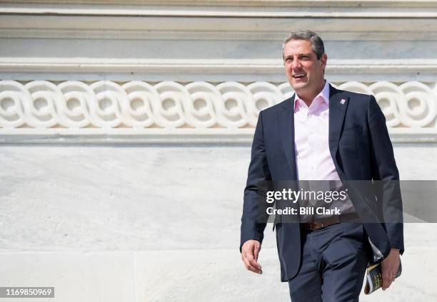 Rep. Tim Ryan, D-Ohio, walks down the House steps of the Capitol after the final votes of the week on Friday, Sept. 20, 2019.