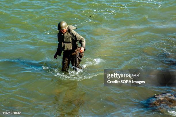 Soldier walks on water at river Waal during the event. On this day in 1944, 260 men of the 82nd Airborne Division went paddling to the other side of...
