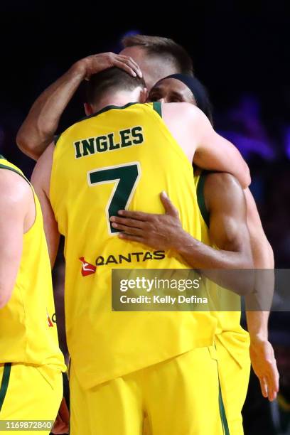 Patty Mills of the Boomers an Joe Ingles of the Boomers celebrate winning during game two of the International Basketball series between the...